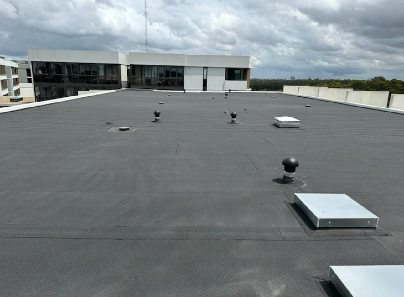 Rooftop torch-on membrane, Wentworth Point — photo 4