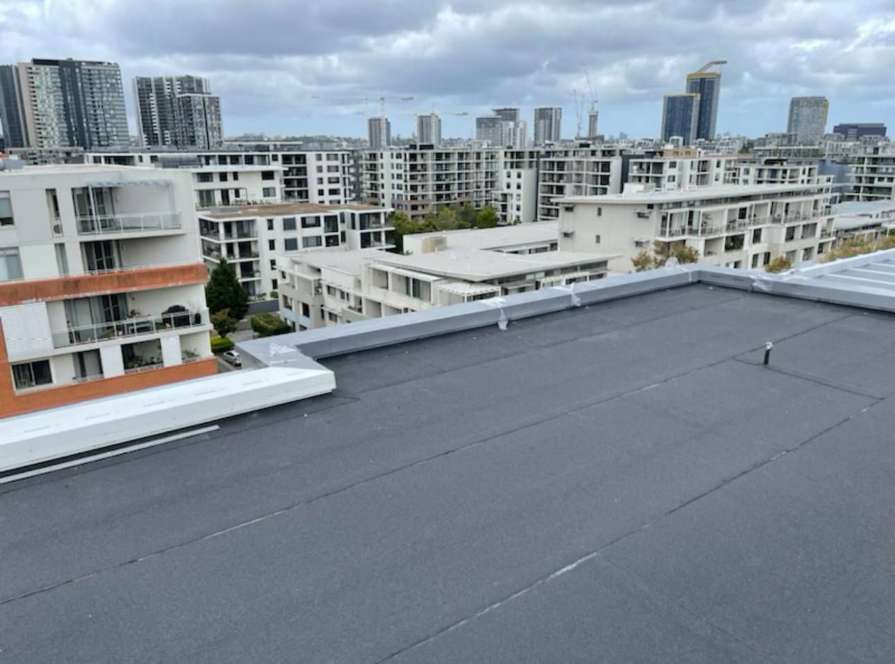 Rooftop torch-on membrane, Wentworth Point — photo 2