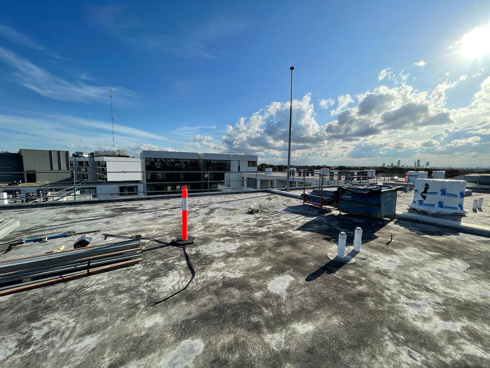 Rooftop membrane replacement on an occupied apartment building, Wentworth Point
